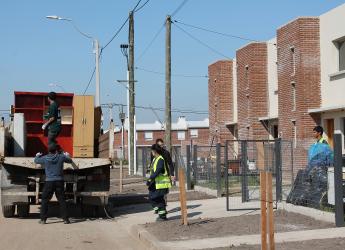 Mudanza de familias del Asentamiento Chacarita de los Padres a Villa Farre 